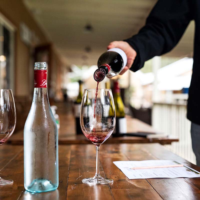 Pouring Red Wine Into Glass during a Hunter Valley Cellar Door Wine Tasting